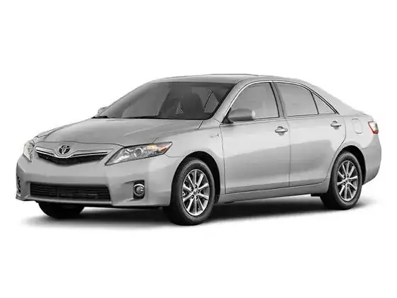 Silver Toyota Camry Hybrid, front three-quarter view